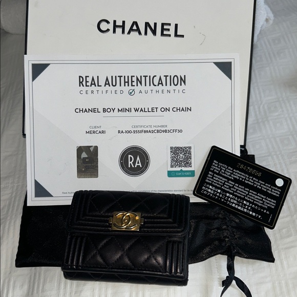 CHANEL Handbags - CHANEL Black Quilted Wallet with Gold Accent with off the market chain.
